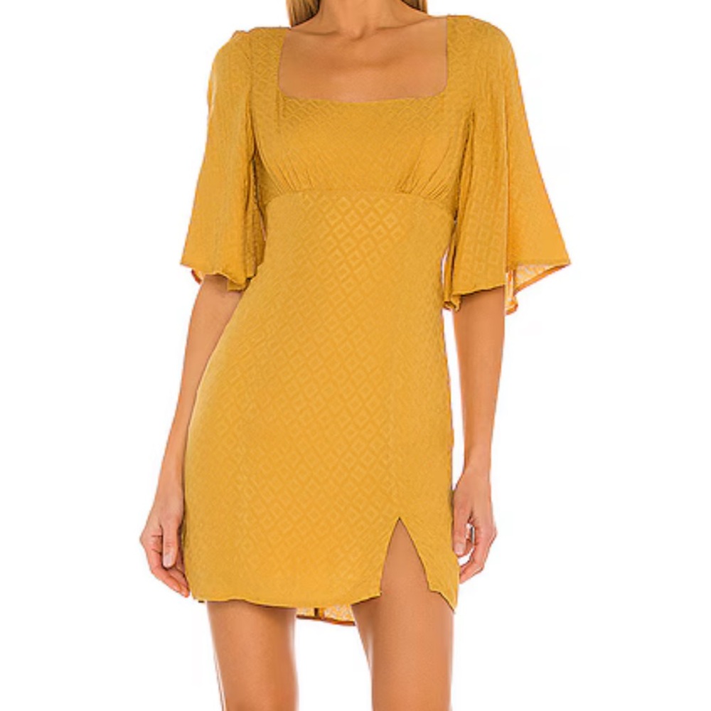 Mini House of Harlow dress - yellow- never worn.